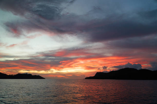 istock Red sunset over Curieuse and Praslin 849412538