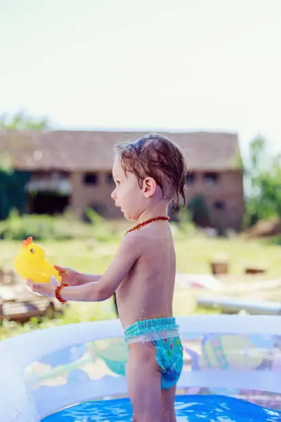 Male child plays in the water