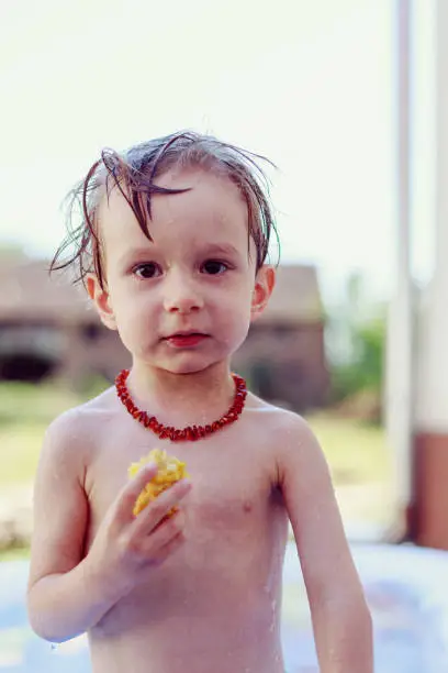 Male child plays in the water