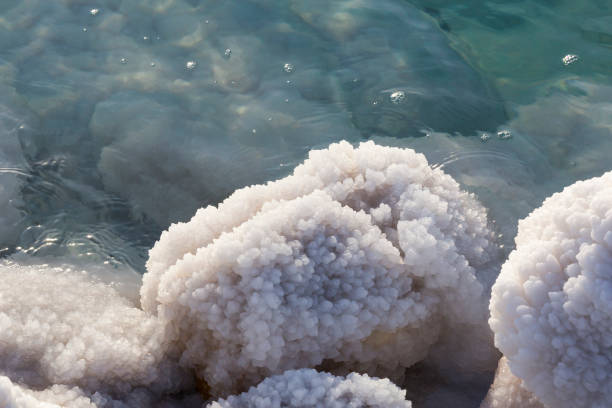 istock Dead Sea salt deposits stones white crystals 849418310