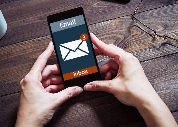istock The woman received an email online on a mobile phone. E-mail message icon. 849418880