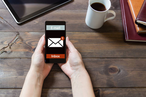 istock The woman received an email online on a mobile phone. E-mail message icon. 849418892