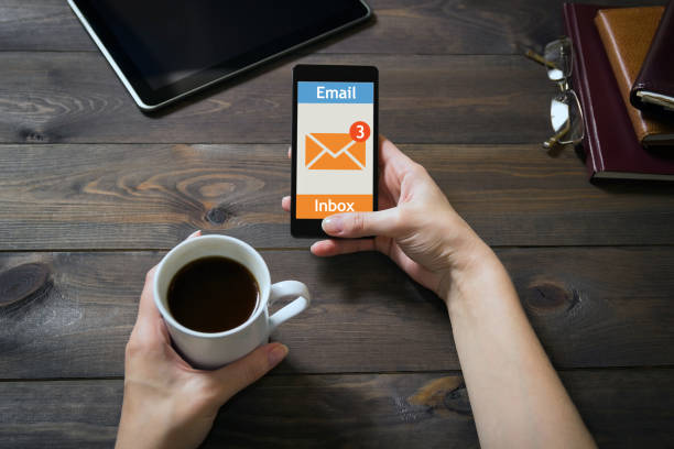 istock The woman received an email online on a mobile phone. E-mail message icon. 849422230