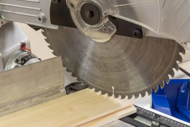 Cutting circle blade saw closeup. Carpentery and woodworking series.