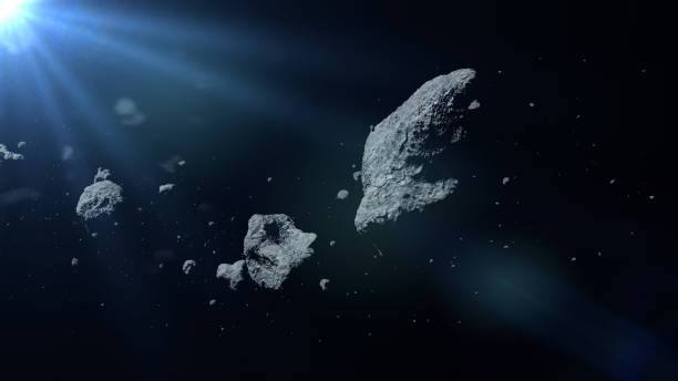 istock a swarm of asteroids lit by the Sun 849427754