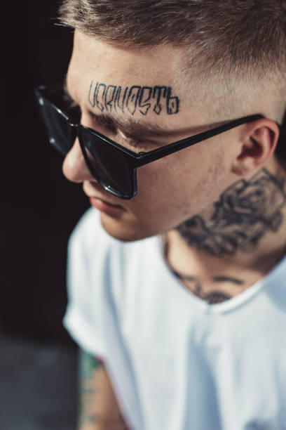 istock Portrait of young tattooed man 849428880