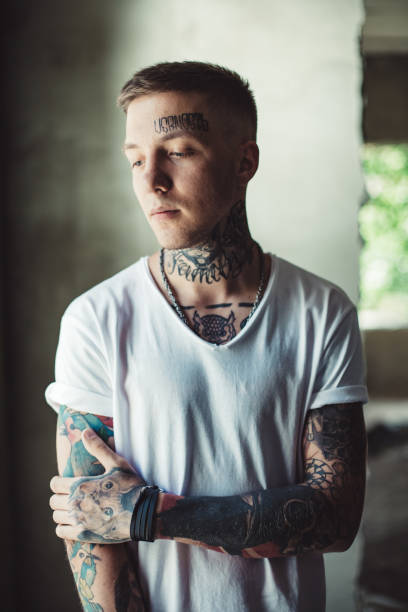 istock Handsome man with tattooed body 849429096