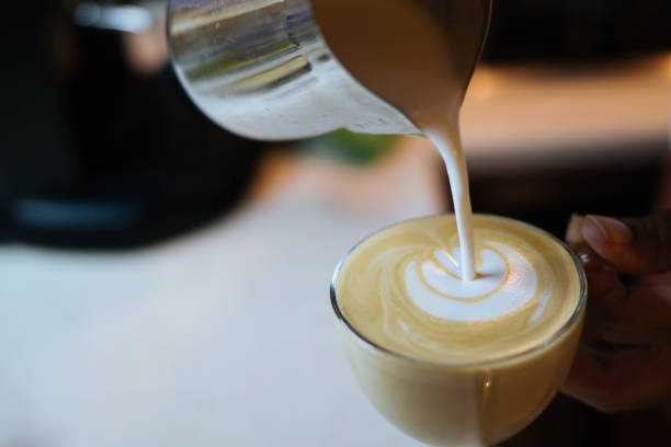 istock Barista Pouring Latte Froth Art 849454916