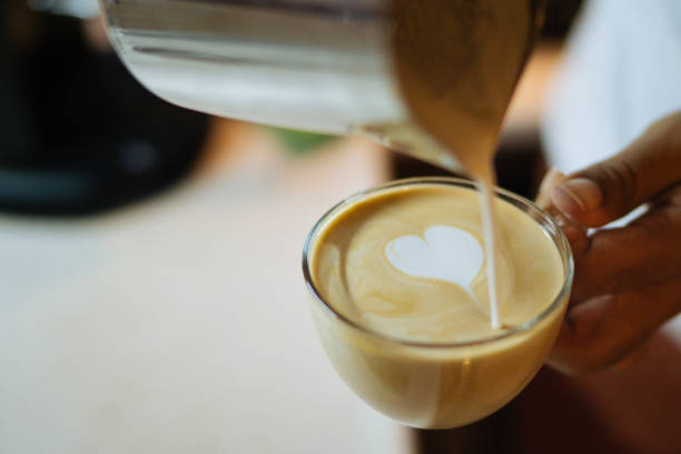 istock Barista Pouring Latte Froth Art 849455128