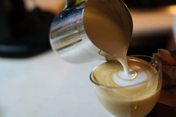 istock Barista Pouring Latte Froth Art 849455130