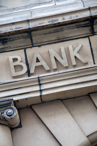 istock Bank Sign on Building Facade 849475712