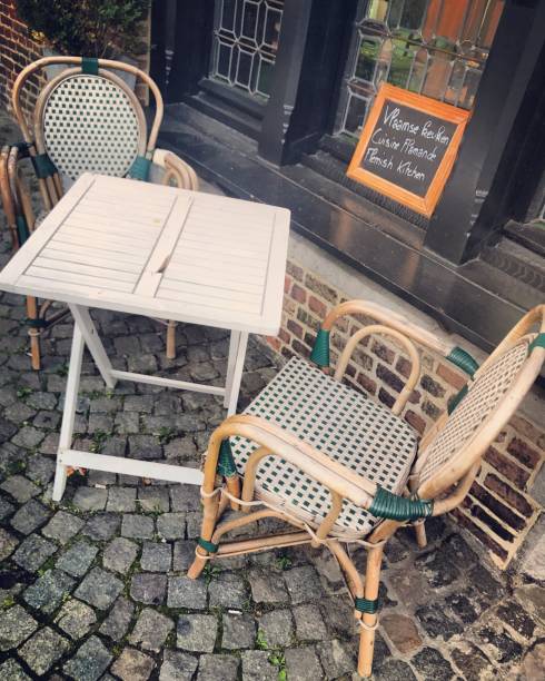 istock Empty sidewalk cafe in Brugge serving local food, Belgium 849476198