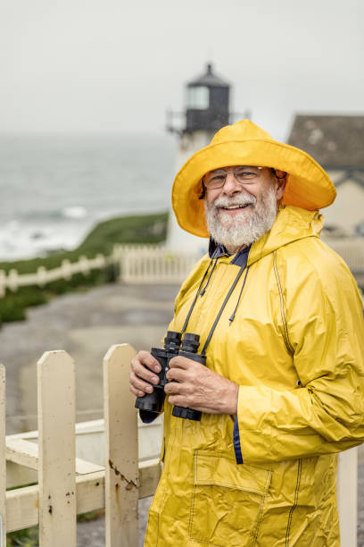 50+ Fisherman Sailor Raincoat Yellow Stock Photos, Pictures & Royalty-Free  Images - iStock
