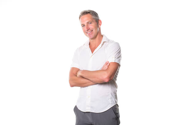 istock Portrait of confident mature man standing on white background 849479414