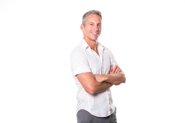 istock Portrait of confident mature man standing on white background 849479468