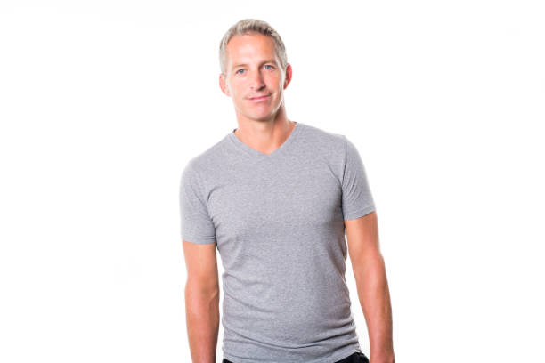 istock Portrait of confident mature man standing on white background 849482192