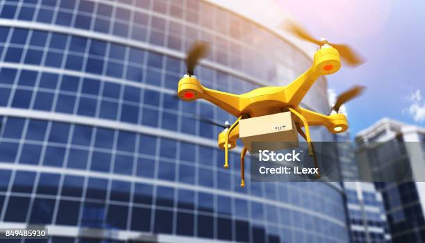 Quadrocopter Carrying A Parcell Stock Photo - Download Image Now - Drone, Drone Point of View, Delivering