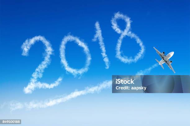 Happy New Year 2018 Drawing By Airplane In The Sky Stock Photo - Download Image Now - 2018, Abstract, Airplane