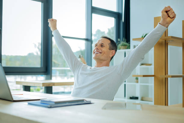 istock Happy positive man holding his hands up 849507332