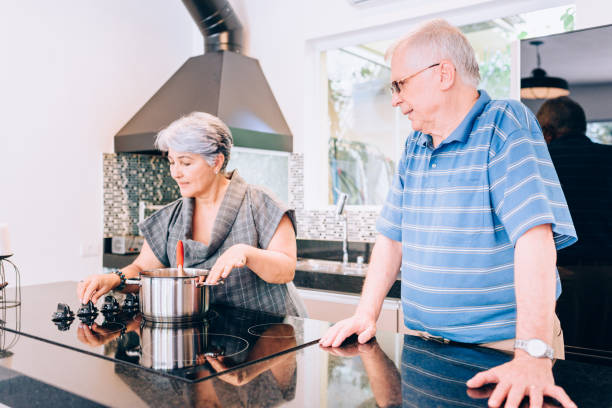 istock Senior couple cooking in the kitchen 849513544