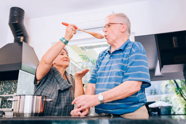 istock Senior couple cooking in the kitchen 849514072