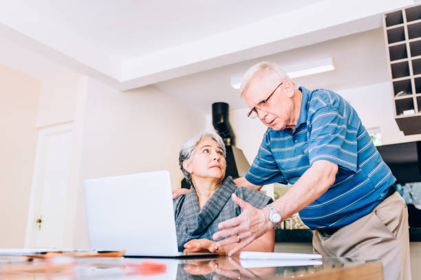 istock Senior couple getting bad news on computer 849524874
