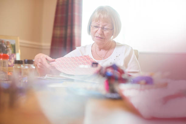 istock Senior woman making greeting cards 849525976