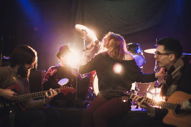 istock Rock band performing in the club 849532892