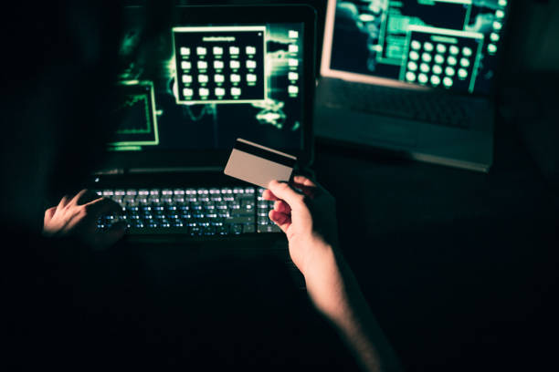 istock Hacker stealing money from credit cards 849535752