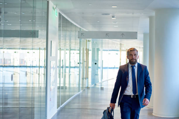 istock Confident businessman in airport 849539226