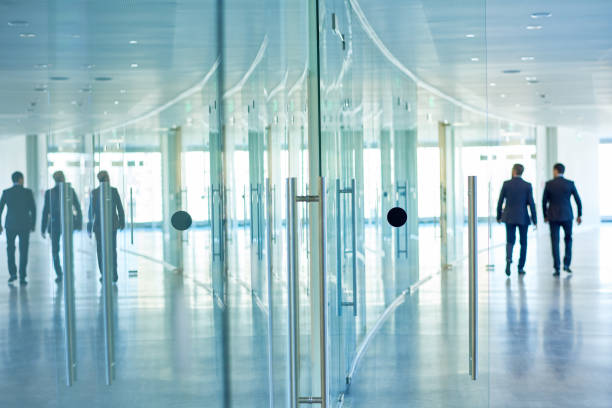 istock Office corridor with glassy walls 849539312