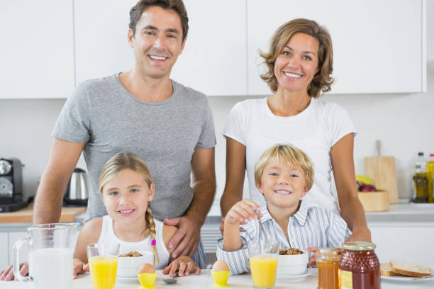 istock Happy family at breakfast 849543790