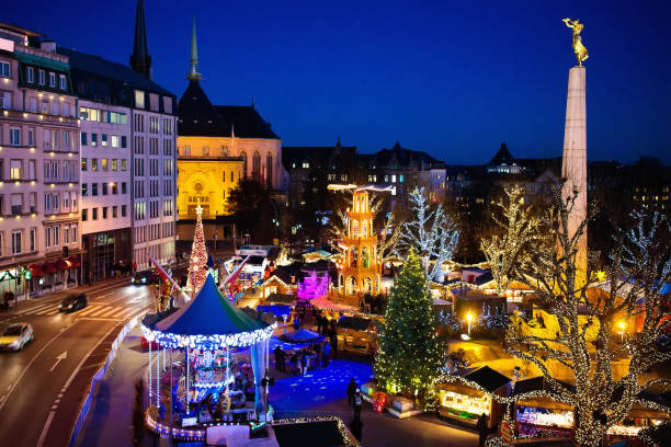 istock Christmas market. Winter fair with tree and lights. 849546194