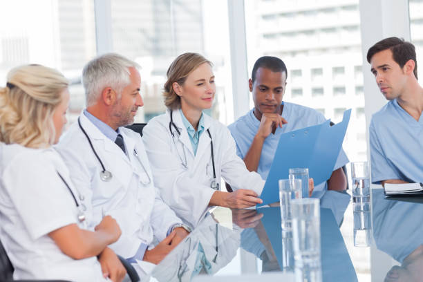 istock Medical team looking at a file 849552026