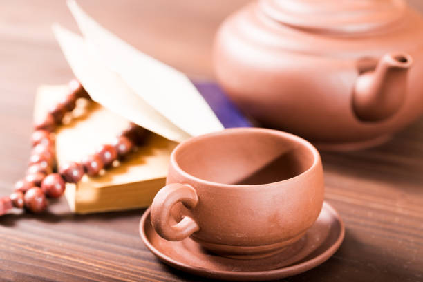 An empty coffee cup laying on its side