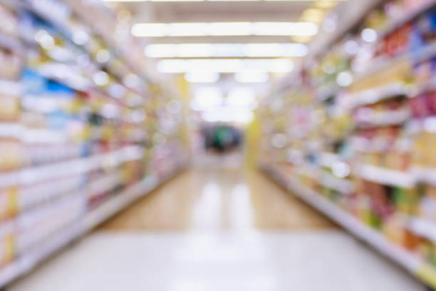 istock Supermarket aisle blur abstract background 849575120