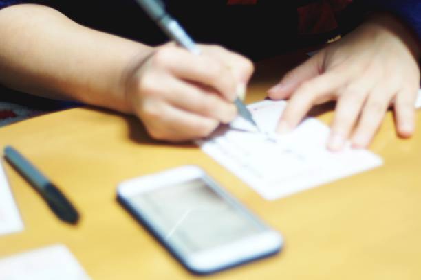 istock Woman writing  New Year's card 849579340