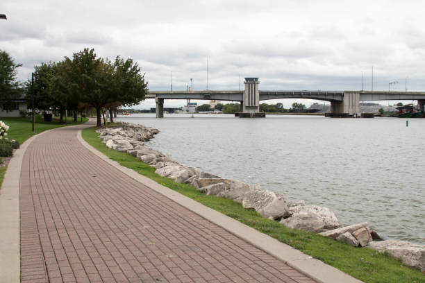 istock Brick walkway along the Fox river in Green Bay, Wisconsin 849582754