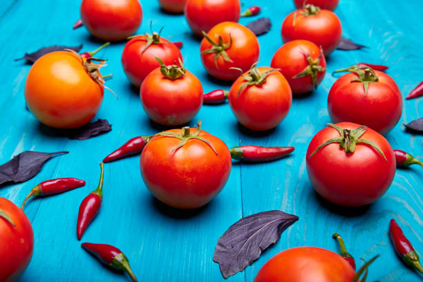 istock Vegetables on blue wooden background. 849593392