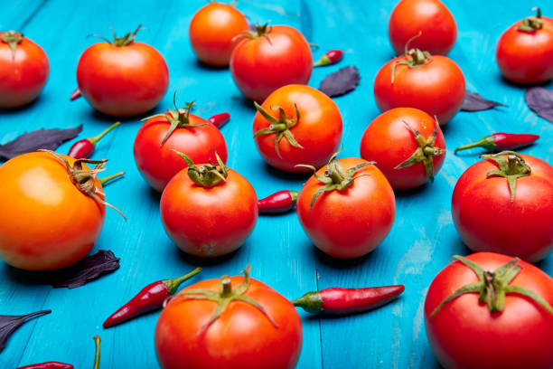 istock Vegetables on blue wooden background. 849593460