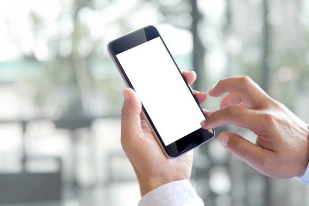 istock Business man hands holding and using mobile phone. 849599328