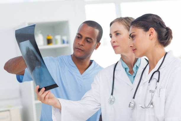 istock Medical team analysing an xray 849614852
