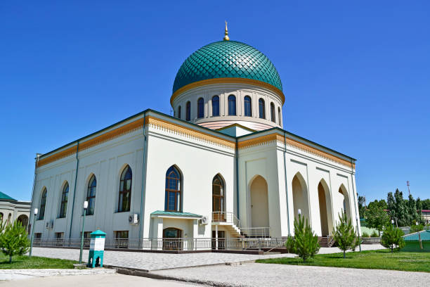 istock A new mosque with a large green dome. 849617734