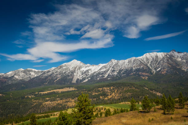 Snowy Spanish Peaks Looking North from Big Sky toward the Spanish Peaks, which recently received a dusting of snow. big sky ski resort stock pictures, royalty-free photos & images