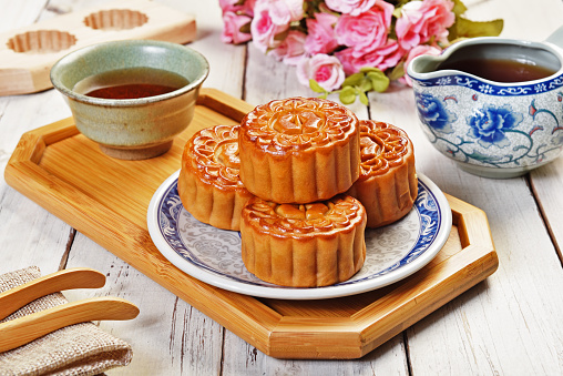 Moon cake and tea,Chinese mid autumn festival food.