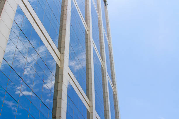 istock The building reflects with blue sky. 849640474