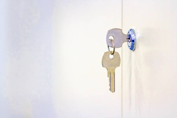 istock Two cabinet keys with white steel cabinet 849645984