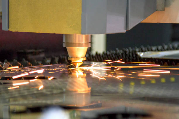 istock CNC laser cut machine while cutting the sheet metalCNC laser cut machine while cutting the sheet metal 849653276