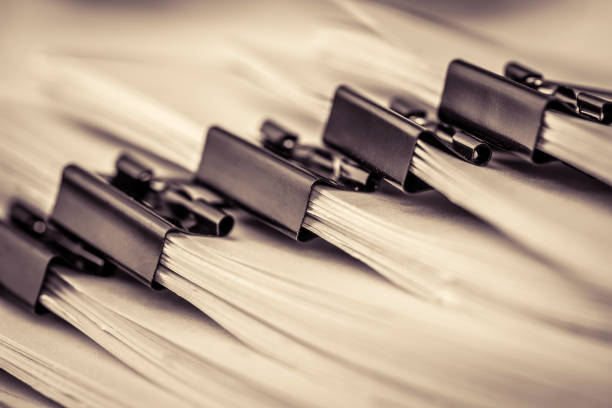 istock extreamly close up the stacking of office working document with paper clip folder 849656426