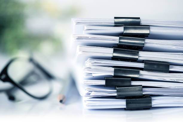 istock extreamly close up the stacking of office working document with paper clip folder 849656606